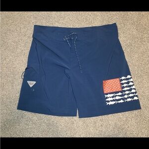 Columbia Navy Swim Trunks with Red & White Fish Flag Accent